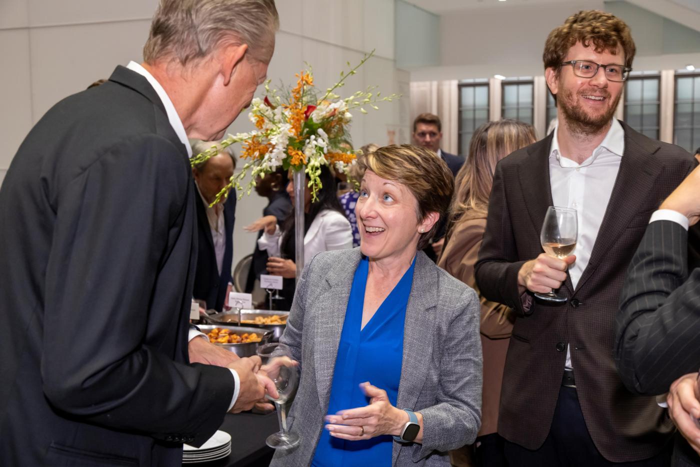 Professors Andy Moravcsik, Frances Lee, and Greg Conti chat at celebration