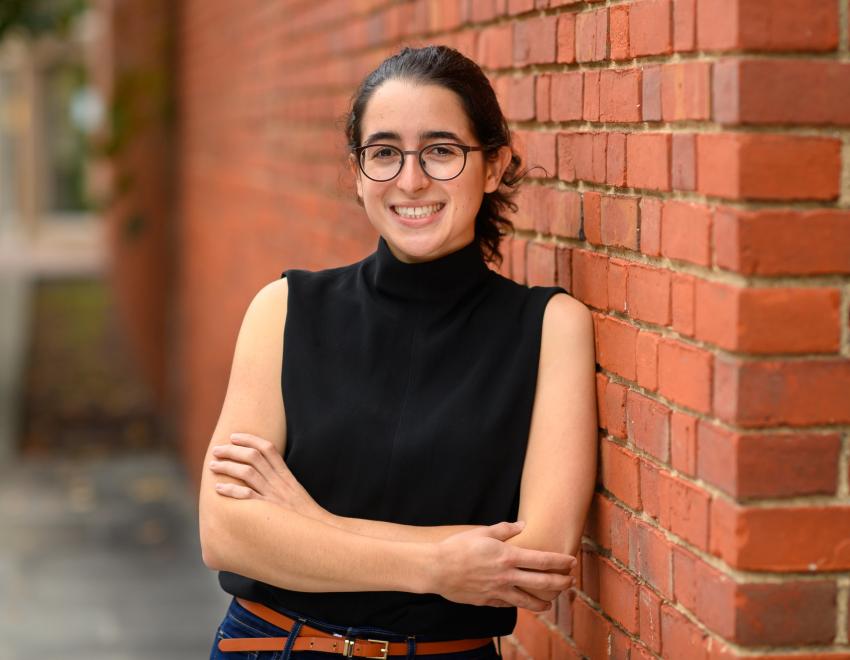 Young woman in black sleeveless shirt