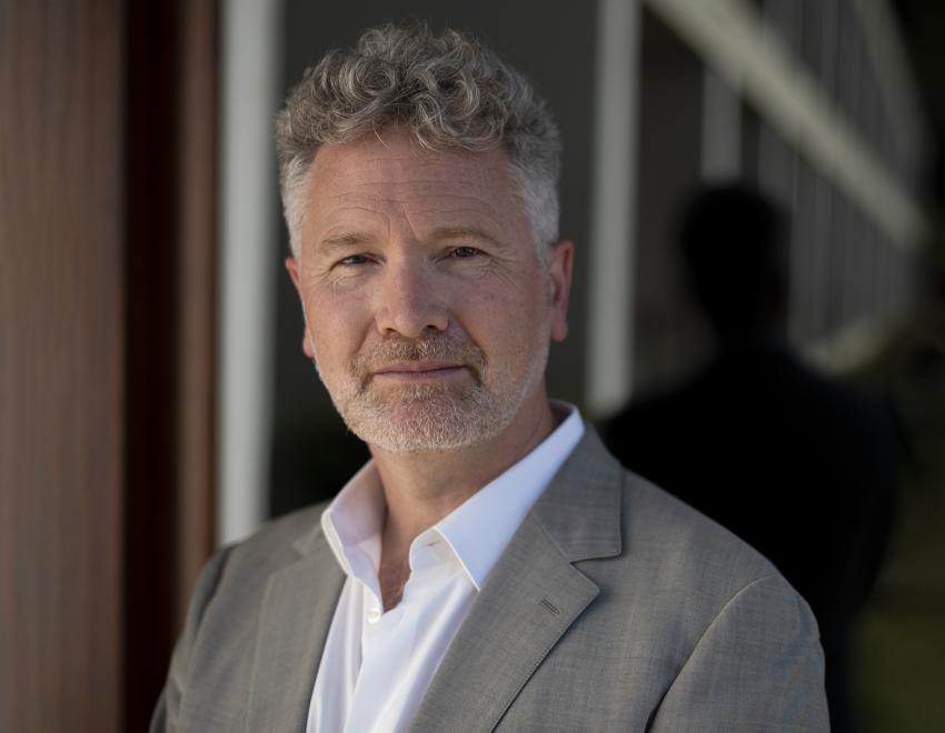 Man in suit jacket with white shirt