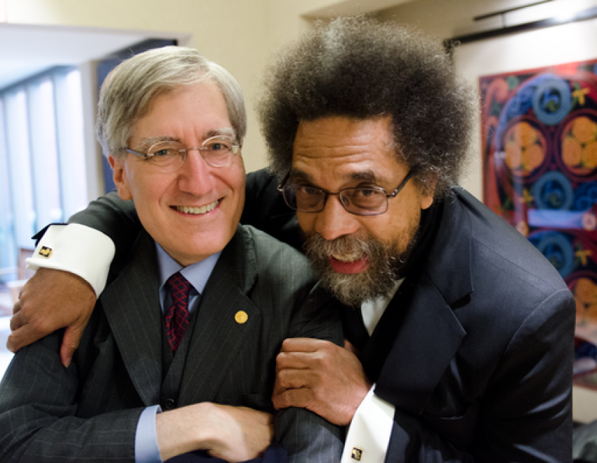 Cornel West with his arms around Robert George